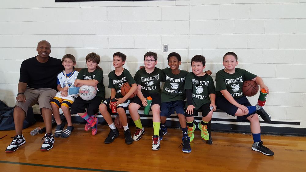 A Camp Oliver team with their coach